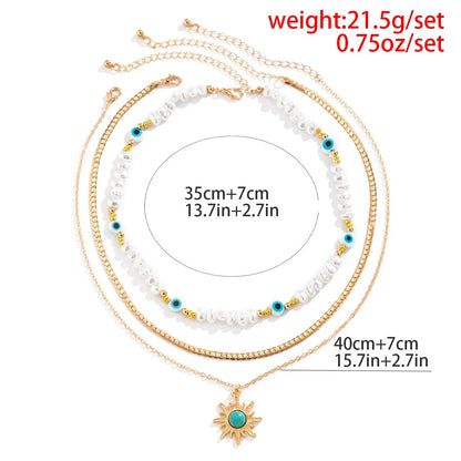 Set van Gelaagde Kettingen Parels & Boze Oog – Boho Zonnehanger