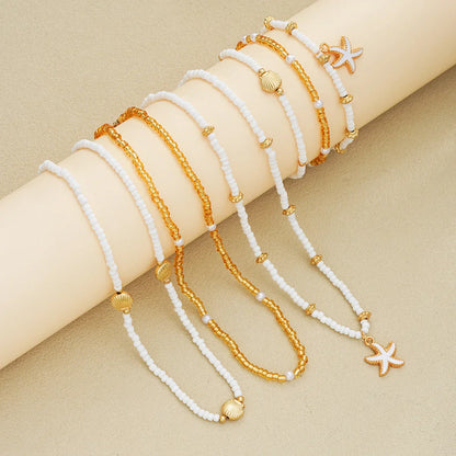 Set van sieraden met zeesterren en kralen - 6 stuks