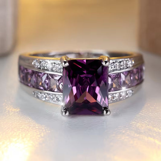 Amethist ring met kanaalzetting in zilver