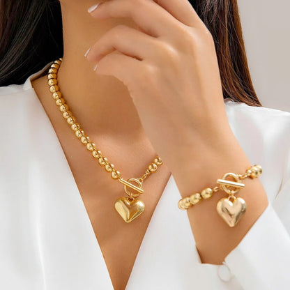 Set van armband en ketting met hartvormige hanger van 2 stuks