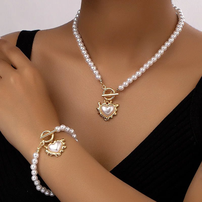 Set van armband en ketting met hartvormige hanger van 2 stuks