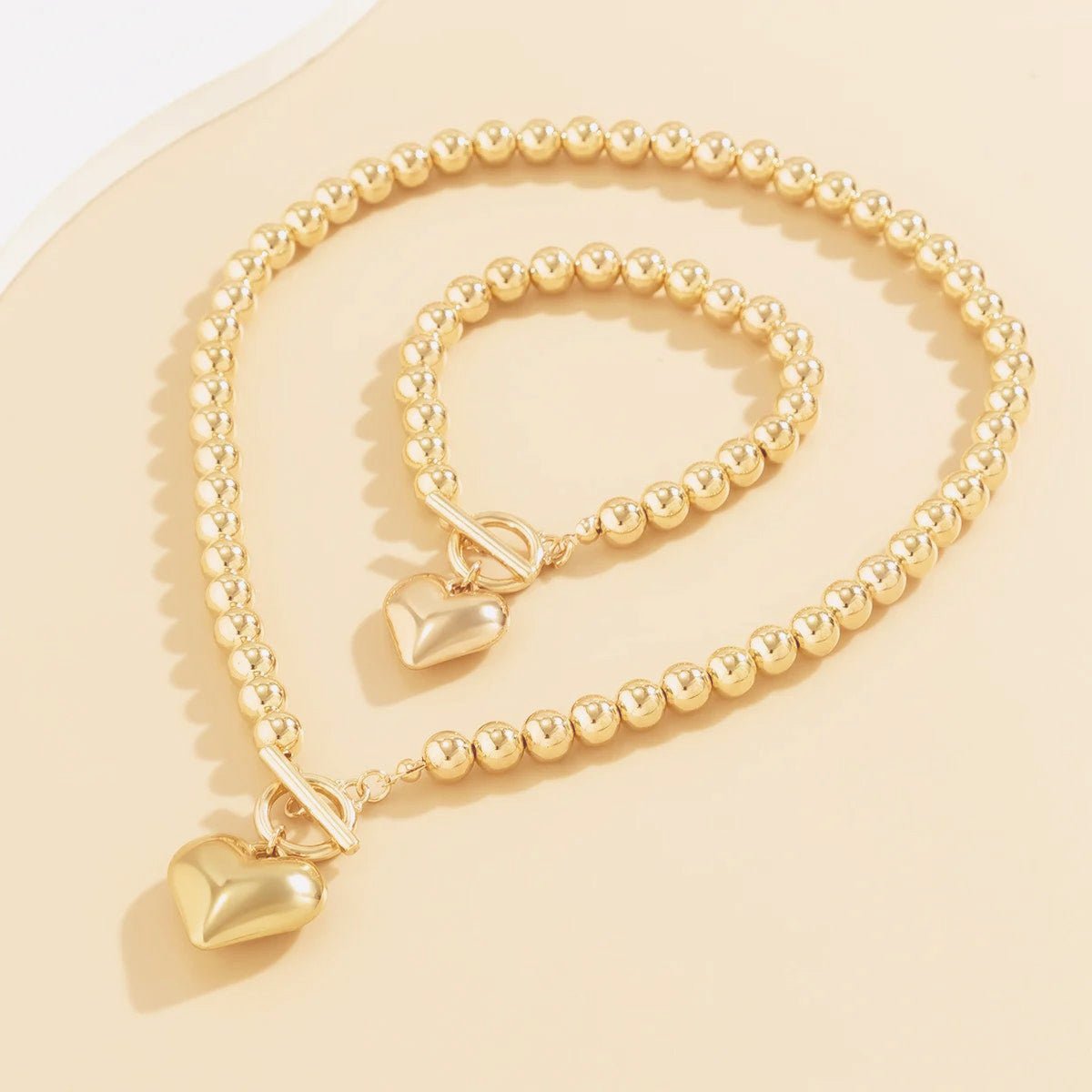 Set van armband en ketting met hartvormige hanger van 2 stuks