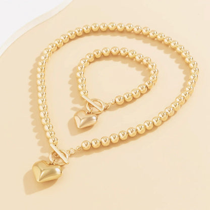 Set van armband en ketting met hartvormige hanger van 2 stuks