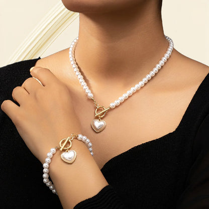 Set van armband en ketting met hartvormige hanger van 2 stuks