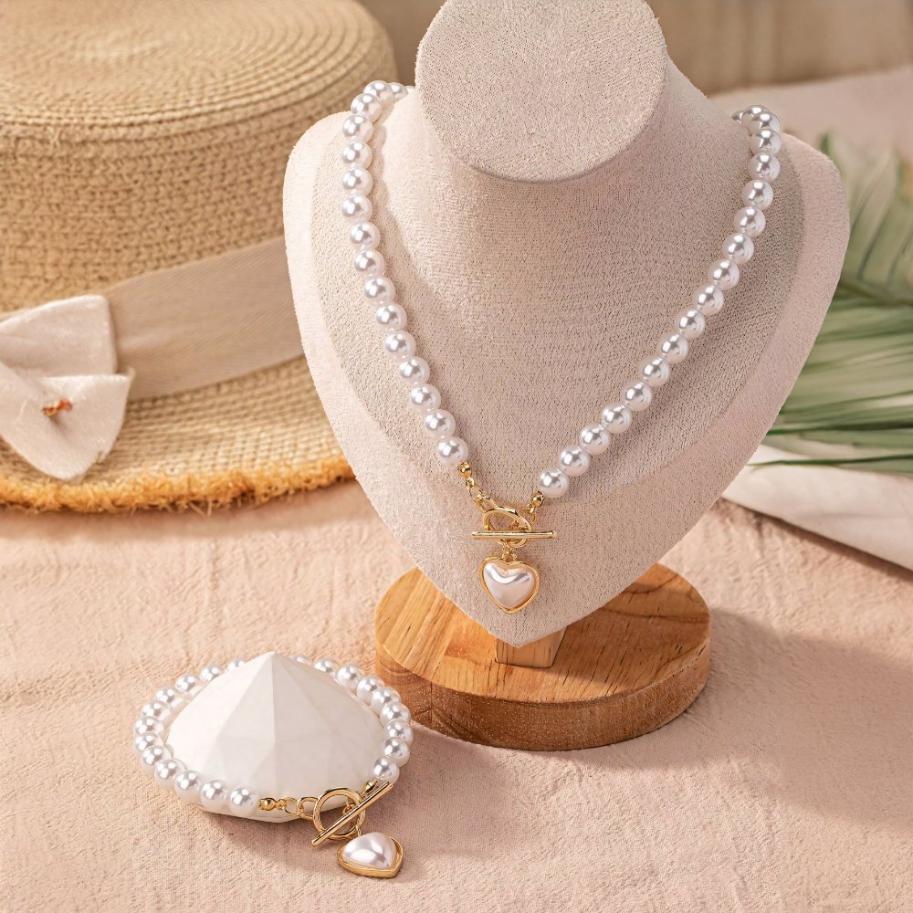 Set van armband en ketting met hartvormige hanger van 2 stuks