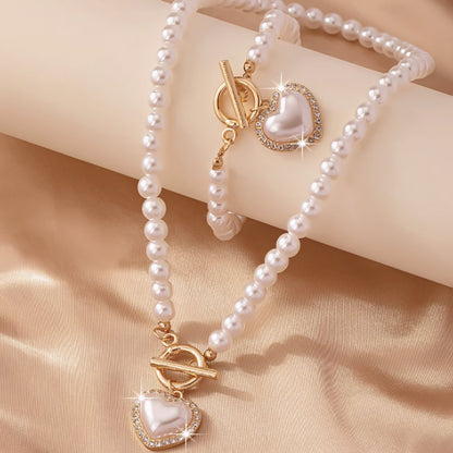 Set van armband en ketting met hartvormige hanger van 2 stuks