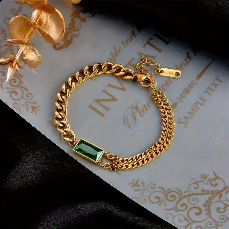 Gouden armband met smaragd barrette