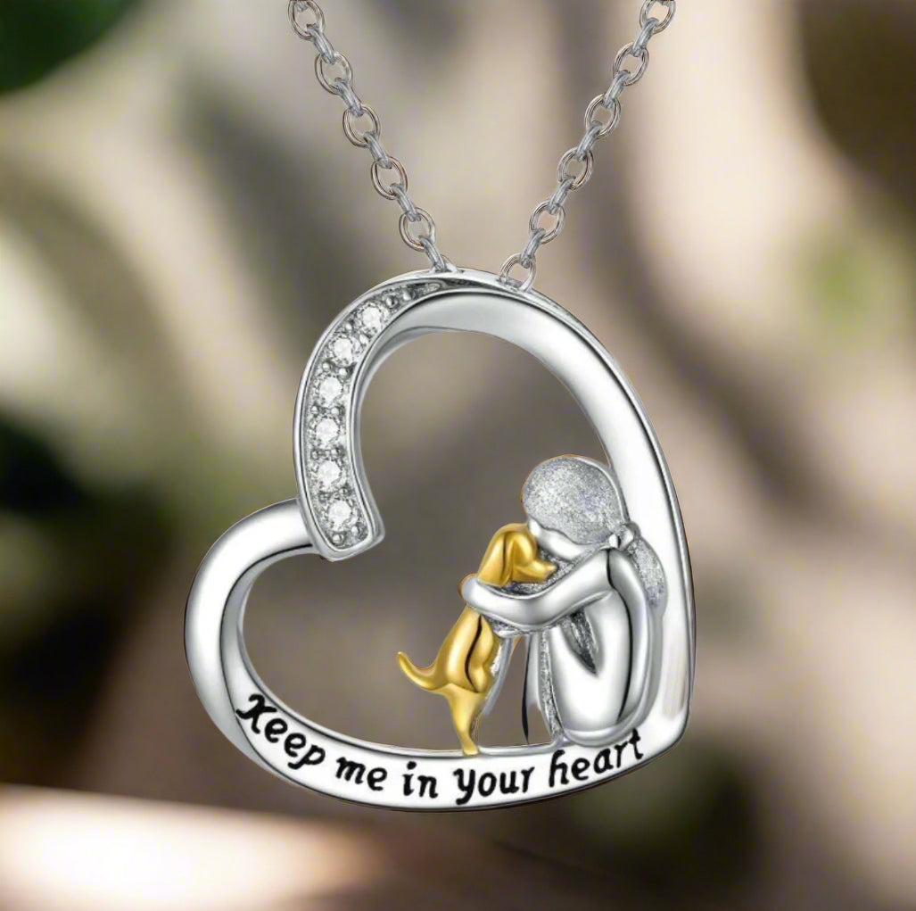 Zilveren hartketting met hond en zirkoniasteentjes