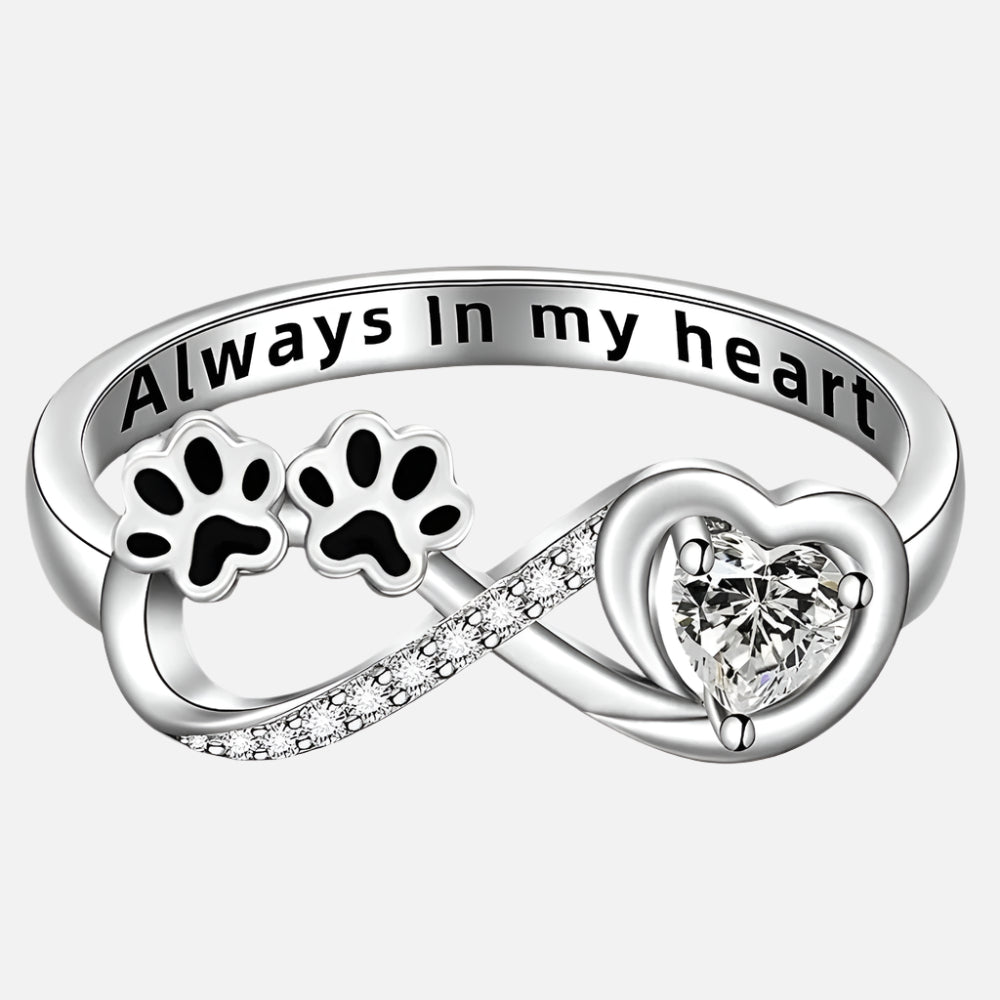Ring met pootafdruk, hart en oneindigheidsteken